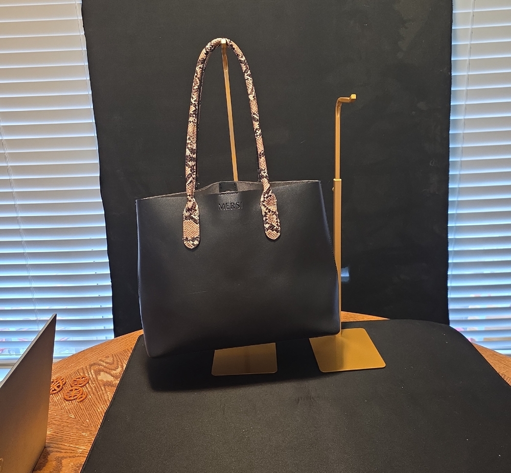 Black Tote with Snake-Print Handles by Versi